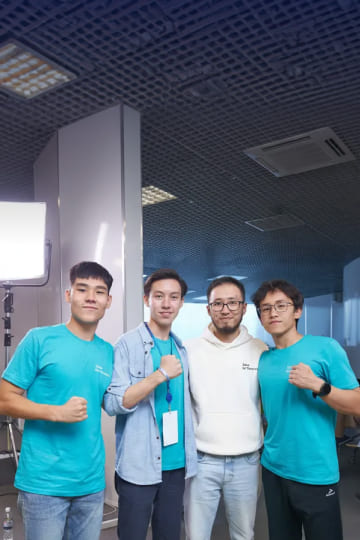 Beelieve team is taking a picture with Samsung mentor (Left to right Adilet Dauleti, Zhangerey Bekbulat, Berik Umarov - Samsung, Amirkhan Aidarkhan)