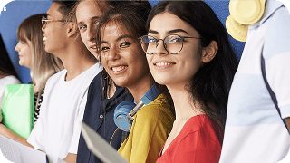 Students are smiling brightly as they take a photo together